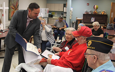 Neuhaus visits veterans at St. Josephs Place and Schervier long term care facilities ahead of Veterans Day